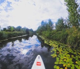 SUP in Gent: Geniet van de frisse buitenlucht en het prachtige uitzicht.